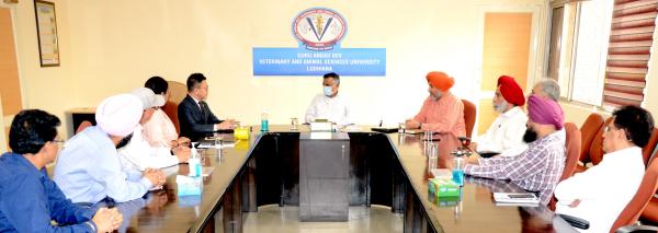 Dr. Inderjeet Singh, VC chairing meeting